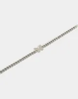 Pulsera dorada de eslabones gruesos con dije de mariposa con strass.