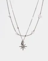 Cadena doble plateada con dije de estrella y cuentas de cuarzo rosa.