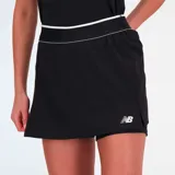 Falda deportiva negra con cintura elastizada blanca y logo de la marca en la parte inferior.