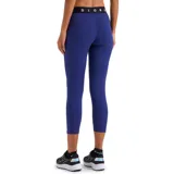 Calza deportiva Diadora T2 7/8, color azul con cintura elástica negra con logo de la marca.