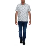 Jeans azul oscuro de corte slim, con tecnología Coolmax para confort térmico y elasticidad.