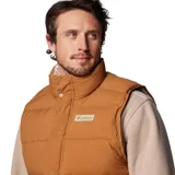 Chaleco reversible Columbia color marrón con relleno de plumón. Tiene cierre frontal con solapa, bolsillos con cremallera y dobladillo ajustable con cordón. El tejido Omni-Shield™ repele la humedad y resiste las manchas.
