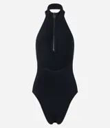 Body negro de poliamida seamless, con cuello halter y cierre frontal con cremallera.