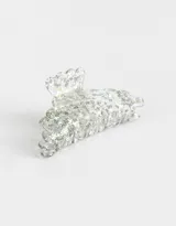 Broche para el pelo plateado con glitter.