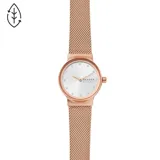 Reloj Skagen con malla de acero color oro rosa y esfera plateada con incrustaciones.