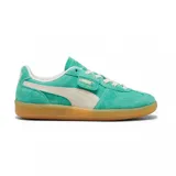 Championes Puma Palermo Vintage color verde con detalles en blanco y suela color caramelo.