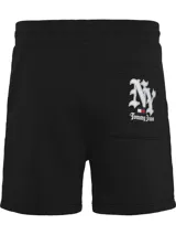 Short deportivo negro de algodón con cintura elástica ajustable con cordón, bolsillos laterales y bolsillo trasero con logo Tommy Jeans estampado en estilo gótico.