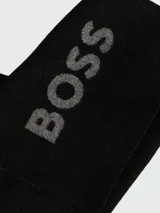Bufanda negra de lana con detalle de logo Boss en cuero sintético.