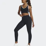 Calzas de compresión negras de tiro alto, confeccionadas en tejido Brushed SLX, que ofrecen cobertura total y un acabado mate.