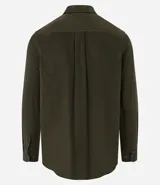 Camisa blanca de manga larga, confeccionada en terciopelo con cuello clásico y bolsillos frontales.