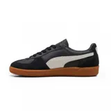 Championes Puma Palermo LTH, color blanco con detalles en lila y suela color caramelo.