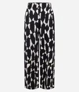 Pantalón de mujer modelo wide leg, con cintura elástica y estampado abstracto en blanco y negro. Confeccionado en tejido piqué de viscosa certificada.