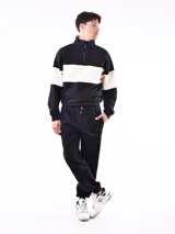 Pantalón de jogging gris oscuro con cintura elástica ajustable con cordón y puños ajustados.