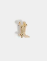 Pin dorado con forma de bota de cowboy con flores y espuela con strass.