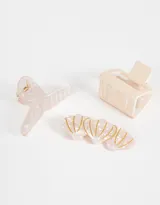 Set de accesorios para el pelo que incluye dos broches, uno de 9 cm y otro de 5,5 cm, y una hebilla francesa con forma de caracolas de mar.