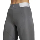 Calza gris de tiro alto con cintura elástica jacquard metalizada, confeccionada en tejido suave y elástico con tecnología Aeroready.