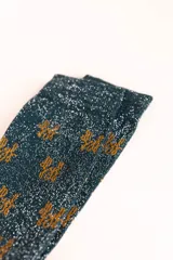 Calcetines de caña media color petróleo con glitter y logo Dfyf en color dorado.