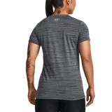 Remera Under Armour Tech Twist de mujer, color rosa jaspeado, de corte entallado, con mangas cortas y cuello en V.