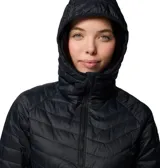 Chaqueta híbrida para mujer, color negro, con cuerpo acolchado con aislamiento Thermarator y paneles laterales softshell elásticos. Presenta cuello alto con protección de barbilla, capucha con ribete y cierre frontal con cremallera.