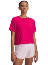 Remera deportiva Under Armour color fucsia de corte holgado y mangas cortas.