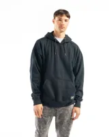 Buzo canguro negro con capucha, bolsillo frontal y corte oversized. Confeccionado en felpa de algodón y poliéster, con rib en puños y ruedo.