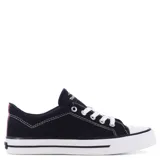 Zapatilla negra tipo derby con suela blanca, materiales de lona y cierre de cordones.