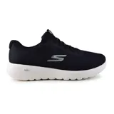 Championes deportivos Skechers Go Walk Joy, color negro con logo plateado, capellada de malla y cordones elásticos. Posee entresuela acolchada 5GEN, plantilla transpirable Skechers Air-Cooled Goga Mat y suela de tracción flexible.