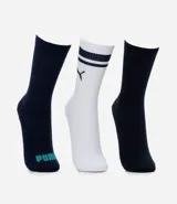 Kit de tres pares de medias deportivas Puma de caña larga. Un par color beige con dos rayas marrones horizontales en la parte superior y logo marrón en el tobillo. Un par color crema liso con logo blanco en el tobillo. Un par color marrón con una raya blanca horizontal en la parte superior y logo blanco en el tobillo.