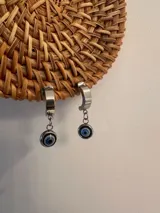 Caravanas colgantes con diseño de ojo turco, enchapadas en plata.