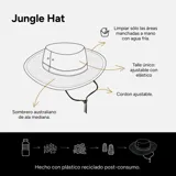 Sombrero tipo bucket hat de color mostaza, confeccionado en tela ripstop con protección UV, secado rápido y repelente al agua. Presenta una cinta decorativa con presillas en la corona y cordón ajustable con tanca para la barbilla. Lleva bordado el nombre "Martha" en blanco.