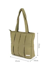 Bolso shopper color naranja con diseño acolchado y cierre superior.