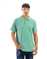 Remera polo verde con cuello y mangas con borde blanco, confeccionada en algodón.