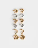 Set de seis pares de aros tipo argolla, con cierre de tuerca. Incluye argollas pequeñas y medianas, en colores dorado y plateado.