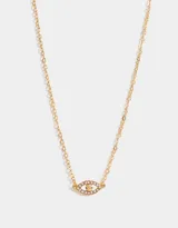 Collar de cadena corta dorada con dije de ojo con strass, con cierre de mosquetón.