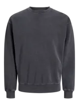 Buzo de algodón gris oscuro con cuello redondo y calce holgado. Confeccionado en tejido loopback, de mangas largas y puños y ruedo acanalados. Un básico ideal para un look casual o de fin de semana.