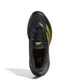 Championes Adidas Game Chaser negros con detalles dorados, ideales para entrenamiento.