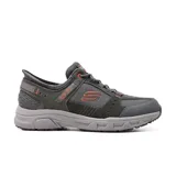 Championes grises Skechers Hands Free Slip-ins Relaxed Fit: Oak Canyon Consistent Winner, diseñados para trekking. Capellada de gamuza, sintético y malla, con cordones elásticos. Plantilla Skechers Air-Cooled Memory Foam y suela flexible de alta tracción.