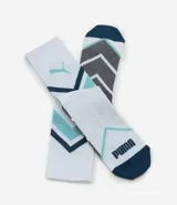 Medias deportivas Puma de caña alta, color blanco con detalles en azul y negro. Diseño con compresión y estampado geométrico.