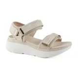 Sandalias bajas color beige con plataforma blanca y tiras con ajuste de velcro.