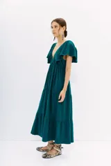Vestido largo al tobillo con escote en V y mangas amplias, de calce relajado y recorte elastizado en la cintura.