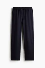 Pantalón azul marino de lyocell, corte recto, con cintura elástica ajustable con cordón y bolsillos laterales.