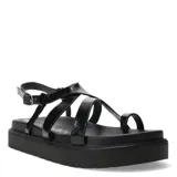 Sandalias negras con tiras finas y suela plana.