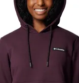 Buzo Columbia de mujer, modelo Marble Canyon Hoodie, color borgoña. Confeccionado en tejido elástico con interior cepillado suave, capucha ajustable con cordón, bolsillo tipo canguro y puños acanalados.