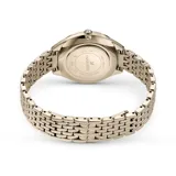 Reloj Swarovski Attract con caja redonda en tono oro champán y esfera guilloché plateada. El bisel y la correa metálica están engastados con cristales transparentes.