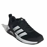 Championes Adidas negros con detalles plateados y suela blanca.
