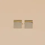 Gemelos cuadrados en plata 925 con detalles en oro.