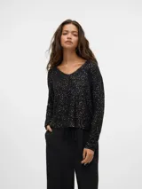 Sweater de punto negro con escote en V, mangas largas y lentejuelas plateadas.