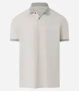 Polo de manga corta color beige, confeccionada en algodón con cuello jacquard y ribete en las mangas.