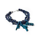 Collar bijou de color azul, compuesto por mostacillas y detalles en tono contrastante.