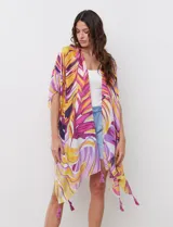 Kimono tejido con diseño abstracto en colores vibrantes, de manga japonesa y terminación con borlas.